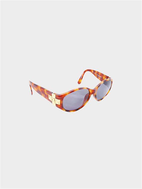 Yves Saint Laurent Tortoise Shell Sunglasses .